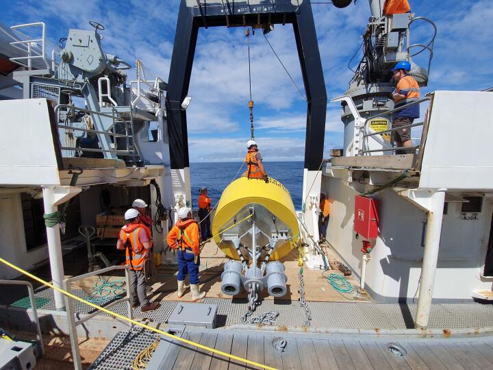 A deep-ocean DART system being deployed  Credit Sarah Searson NIWA