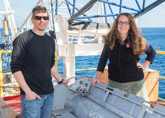 Dr Demian Saffer and Dr Laura Wallace with one of the observatory wellheads before it was installed